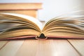 Close Up Open book and stack of books with copy space in relaxation mood Royalty Free Stock Photo