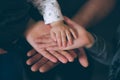 Close up open hands of man and woman and kid with palm up . Family together helping harmony and caring concept