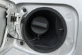 Close up of Open hatch of the car gas tank Royalty Free Stock Photo