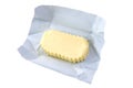 Close up of open pack of organic butter on white backgraund. Royalty Free Stock Photo