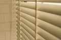 Close-up open venetian blinds. lighting range control sunlight coming from a window. decoration interior. Modern jalousie Royalty Free Stock Photo