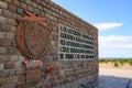 Close up of The Operation Dynamo Memorial to Allied Forces in Dunkirk with sand dunes to the side