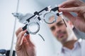 Close-up of optometrist holding messbrille
