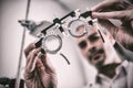 Close-up of optometrist holding messbrille