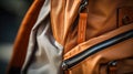 A close up of an orange backpack with zippers, AI
