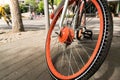 Close up the orange bicycle wheel and tire Royalty Free Stock Photo