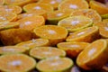 In selective focus a pile of fresh oranges cut in a half Royalty Free Stock Photo