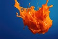 Close up of orange liquid splashing on blue background created using generative ai technology Royalty Free Stock Photo