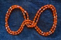 Close up orange plastic bead necklace Royalty Free Stock Photo