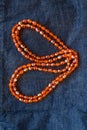 Close up orange plastic bead necklace Royalty Free Stock Photo