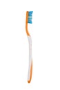 Close up of orange tooth brush isolated on white background Royalty Free Stock Photo