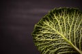 Close up of organic savoy cabbage on the wooden background Royalty Free Stock Photo