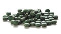 Spirulina Tablets Over White Background Royalty Free Stock Photo