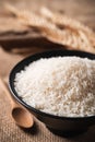 Organic Thai Jasmine rice grain in a black bowl Royalty Free Stock Photo