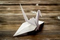 Close up of origami paper bird. DYN concept