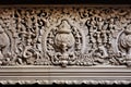 close-up of ornate carvings in a hindu temple