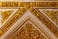 Close-up of ornate gilded golden ceiling