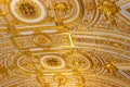 Close-up of ornate gilded golden ceiling