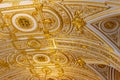 Close-up of ornate gilded golden ceiling