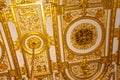 Close-up of ornate gilded golden ceiling