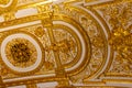 Close-up of ornate gilded golden ceiling