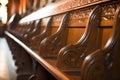 close-up of ornate hand-carved church pews