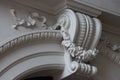 Close-up of ornate white architectural detail on a classical building facade. Royalty Free Stock Photo