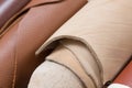 Close up osf cutted piece of leather in roll. Royalty Free Stock Photo