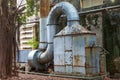 Close-up of outdoor incinerator blower in old dilapidated factory