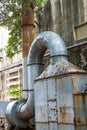 Close-up of outdoor incinerator blower in old dilapidated factory