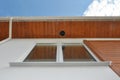 Close up on Outdoor Lighting & Exterior Light Fixtures. Rain Gutter Soffit Board, Fascia Board Installation.