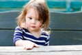 Close-up outdoor portrait of beautiful adorable toddler girl Royalty Free Stock Photo