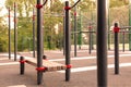 Close up outdoors gym equipment at the park sports ground. Different machines for training, activity at workout space. Royalty Free Stock Photo