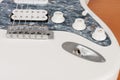 Close up output connector on white electric guitar, studio shoot Royalty Free Stock Photo