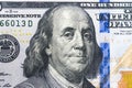 Close up overhead view of Benjamin Franklin face on 100 US dollar bill. US one hundred dollar bill closeup. Heap of one hundred Royalty Free Stock Photo