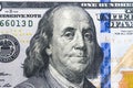 Close up overhead view of Benjamin Franklin face on 100 US dollar bill. US one hundred dollar bill closeup. Heap of one hundred do Royalty Free Stock Photo