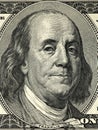 Close up overhead view of Benjamin Franklin face on 100 US dollar bill. US one hundred dollar bill closeup Royalty Free Stock Photo