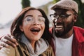 Close up of overjoyed smiling international couple