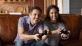 Close up overjoyed young couple playing video game together Royalty Free Stock Photo