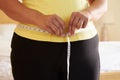 Close Up Of Overweight Woman Measuring Waist Royalty Free Stock Photo