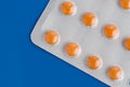 Close-up of a pack of orange pills Royalty Free Stock Photo