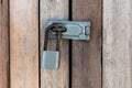 Close up of padlock and old metal hasp