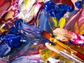 Close up of paint mixed on palette.