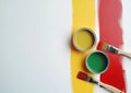 Close-up of paintbrushes and paint cans Royalty Free Stock Photo