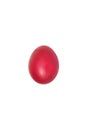 Close-up painted bright red egg in the middle of white background, isolated. Royalty Free Stock Photo