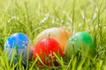 Close up of painted Easter eggs on grass on a sunny day Royalty Free Stock Photo