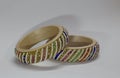 Close up of pair of bangles isolated on white background with space for text Royalty Free Stock Photo