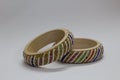 Close up of pair of bangles isolated on white background with space for text Royalty Free Stock Photo