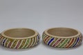 Close up of pair of bangles isolated on white background with space for text Royalty Free Stock Photo