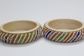 Close up of pair of bangles isolated on white background with space for text Royalty Free Stock Photo